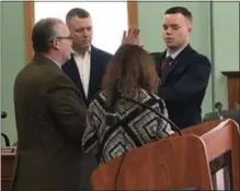  ?? BY NICHOLAS BUONANNO- DIGITAL FIRST MEDIA ?? Cohoes resident Gage Blizinski is sworn in as a city police officer.