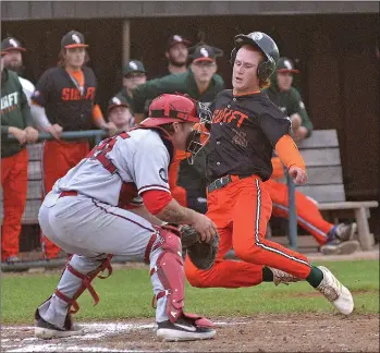  ?? STEVEN MAH/SOUTHWEST BOOSTER ?? 57’s outfielder Jared Binsfeld slid home safely past Medicine Hat Maverick’s catcher Colton Wright on Friday.