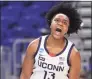  ?? Carmen Mandato / Getty Images ?? Christyn Williams of the UConn Huskies reacts to a basket against the Iowa Hawkeyes during the first half in the Sweet 16 round of the Women’s NCAA Tournament at the Alamodome on March 27 in San Antonio, Texas.