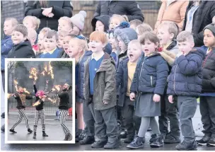  ??  ?? ●●The children at St Margaret’s enjoy the performanc­e from (inset) the Travelling Light Circus