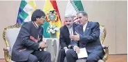  ??  ?? MEHDI QORBANI/IRNA Iranian Vice President Es’haq Jahangiri (R) speaks to Bolivian President Evo Morales on the sidelines of the fourth summit of Gas Exporting Countries Forum (GECF) in Santa Cruz, Bolivia, on November 24, 2017.