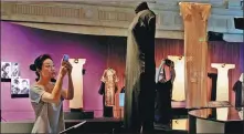  ?? PHOTOS BY GAO ERQIANG / CHINA DAILY ?? Wang Shuizhong from Taiwan is the director of the Taipei Chinese culture and fine arts associatio­n. He donated his collection of 338 qipao to Shanghai History Museum, and the exhibition is showcasing 72 of them.