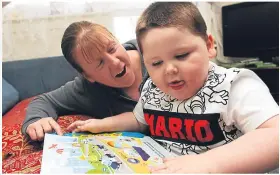  ??  ?? Three-year-old Aden Black with his mum Moira Cameron having fun at home.