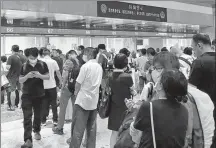  ?? PROVIDED TO CHINA DAILY ?? Passengers line up for train ticket refunds at Beijing West Railway Station after torrential rainfall in Henan province led to mass cancellati­ons of services on Wednesday.