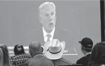  ?? Eric Gay/Associated Press ?? McAllen supporters of Gov. Greg Abbott watch his Friday night debate with Democratic challenger Beto O’Rourke.