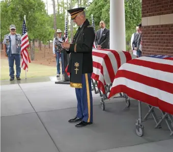  ?? TNS ?? FINAL SALUTE: Retired U.S. Army chaplain Samuel Boone speaks during a funeral ceremony at the Fort Jackson National Cemetery in South Carolina for Marine veteran Danny Ballantyne and Army veteran Joseph Williams, both of whom died with no known relatives.