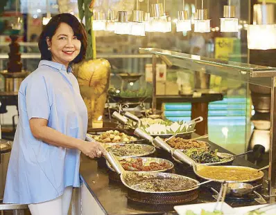  ?? Photo by WALTER BOLLOZOS ?? Queen of Filipino buffets: Maritel Nievera, the heart and soul behind Cabalen, is happy to share Pampanga’s best in Cabalen’s buffet-style dining.