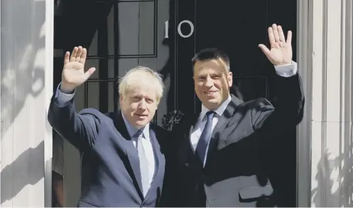  ?? PICTURE: TOLGA AKMEN/GETTY ?? 0 Boris Johnson yesterday in Downing Street with visiting Estonian Prime Minister Juri Ratas