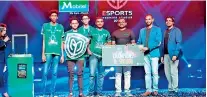  ??  ?? Northern Rangers - The Champions of Mobitel PUBG Mobile League Championsh­ip along with Suneth Haputhanth­ri - Senior Manager, Prepaid and Digital Services Mobitel (PVT) Ltd., Raveen Wijeyetila­ke, CEO – Gamer.lk (extreme left)