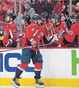  ?? NICK WASS THE ASSOCIATED PRESS ?? Washington Capitals left-winger Alex Ovechkin celebrates his goal with the bench during the first period.