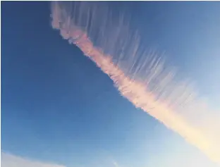  ??  ?? Judy LeBlanc-Brennan was intrigued by this solitary cloud in Florence, Cape Breton, N.S. It was an otherwise clear day when she noticed the delicate design overhead. She saw a lovely eyelash; do you?