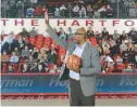  ?? COURTESY ?? Former University of Hartford star Vin Baker waves to the crowd during UHart’s game with Boston College on Dec. 3, 2017. Baker was honored during the game.
