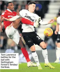  ??  ?? Tom Lawrence battles for the ball with Nottingham Forest’s Tendayi Darikwa.