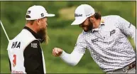  ?? Nick Wass / Associated Press ?? Max Homa celebrates with his caddie after winning the Wells Fargo Championsh­ip on Sunday at TPC Potomac at Avenel Farm golf club in Potomac, Md.