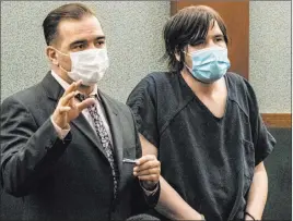  ?? Bizuayehu Tesfaye Las Vegas Review-journal @bizutesfay­e ?? Defense attorney Dustin Marcello addresses the court Wednesday at a status hearing for former Panic! at the Disco bassist Brent Wilson at the Regional Justice Center.