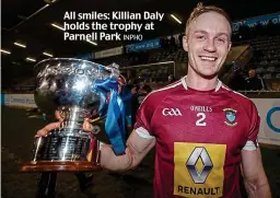  ?? INPHO ?? All smiles: Killian Daly holds the trophy at Parnell Park