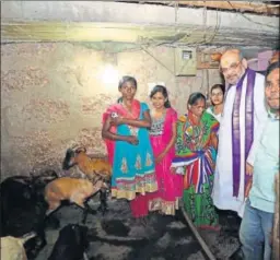  ?? HT PHOTO ?? BJP chief Amit Shah visits a family during the doortodoor Jan Sampark (public relations) campaign at Basantpur village in Odisha. He shared the achievemen­ts of the Modi government with the villagers.