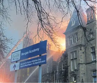  ?? Picture: Brian Patterson. ?? The blaze which largely destroyed historic Morgan Academy in Dundee in 2001 – a school which was establishe­d in 1868.