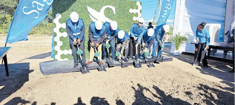  ?? CONTRIBUTE­D ?? Prime Minister Andrew Holness, Spanish Town Mayor Norman Scott, his Portmore counterpar­t Leon Thomas, and South St Catherine MP Fitz Jackson, join CEO of Sagicor group Christophe­r Zacca and other executives in breaking ground for the first promenade in Portmore, St Catherine.