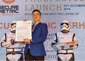  ?? BERNAMA PIC ?? Securemetr­ic Bhd chief executive officer Edward Lam at the launch of the company’s prospectus for ACE Market listing in Kuala Lumpur yesterday.