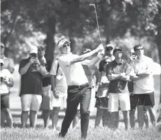  ?? Eric Christian Smith/The Associated Press ?? ■ Ian Poulter hits his third shot on the 13th hole during the third round of the Houston Open golf tournament Saturday in Humble, Texas.