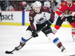  ?? — GETTY IMAGES FILES ?? Nathan MacKinnon has already posted his highest single-season points total (82) of his career in helping lead the Avalanche from the worst team in the West to playoff contenders.