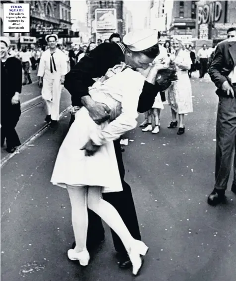  ??  ?? Times square
The sailor’s impromptu kiss captured by Alfred Eisenstaed­t