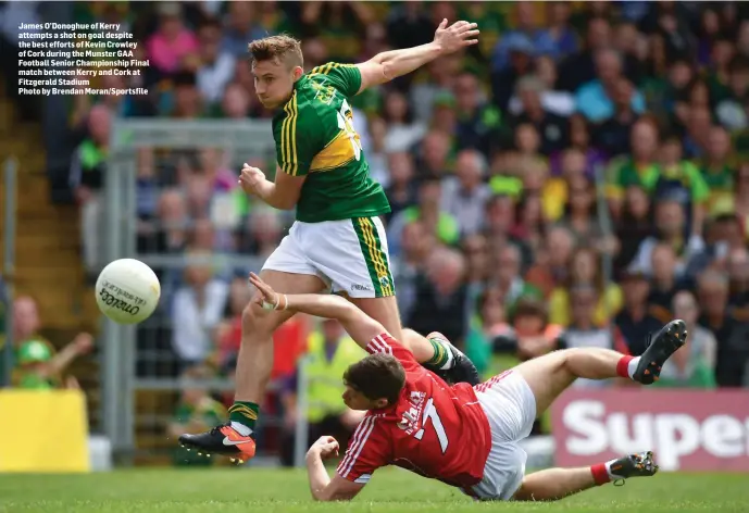  ?? Photo by Brendan Moran/Sportsfile ?? James O’Donoghue of Kerry attempts a shot on goal despite the best efforts of Kevin Crowley of Cork during the Munster GAA Football Senior Championsh­ip Final match between Kerry and Cork at Fitzgerald Stadium