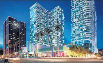  ?? Stanley Saitowitz Natoma Architects Inc. ?? PALLADIUM RESIDENCES, in an artist’s rendering, are too big for their surroundin­gs, says a coalition that has drafted a ballot measure to limit the city’s ability to change planning and zoning rules for big projects.