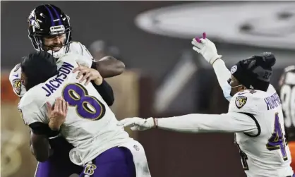  ?? Photograph: Ron Schwane/AP ?? Lamar Jackson (8) celebrates with Justin Tucker (9) after the kicker’s crucial last-minute field goal.