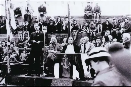  ??  ?? At the inaugurati­on of the first motor lifeboat ‘Ann Isabella Pyemont’ stationed at Kilmore Quay in May 1937 ( from left): Mr. Fuge, Organising Secretary RNLI (standing), Denis Allen TD, chairman Wexford County Council; Rev. Edward Creane CC, Kilmore...