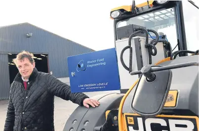  ?? Pictures: Kami Thomson. ?? David Barron of Nether Aden Farm, Mintlaw, with his hybrid JCB tractor; Alan Bruce from SAC Consulting, below left; the hybrid tractor, below middle; and some of the farm’s cattle, below right.