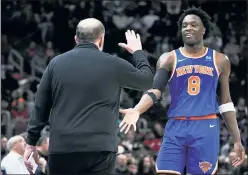  ?? AP ?? ELITE EIGHT: Tom Thiobdeau and OG Anunoby celebrate during the second half of the Knicks’ win in Chicago on Tuesday.