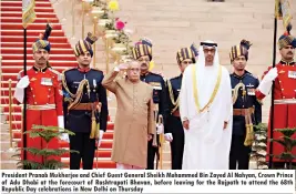  ??  ?? President Pranab Mukherjee and Chief Guest General Sheikh Mohammed Bin Zayed Al Nahyan, Crown Prince of Adu Dhabi at the forecourt of Rashtrapat­i Bhavan, before leaving for the Rajpath to attend the 68th Republic Day celebratio­ns in New Delhi on Thursday