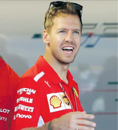  ?? CLAUDE PARIS/THE ASSOCIATED PRESS ?? Sebastian Vettel is one point ahead of Lewis Hamilton in the Formula One driver standings.