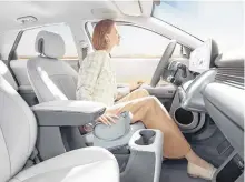  ??  ?? A sliding console with gear selector located behind the steering wheel allows passengers to enter and exit the Hyundai Ioniq 5 cabin on either side.