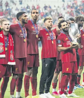  ??  ?? Mo Salah and his Liverpool team-mates after they beat Chelsea in the Super Cup final in Istanbul last August. It may be the only trophy they lift this season