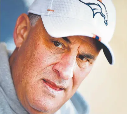  ?? Joe Amon, The Denver Post ?? Broncos head coach Vic Fangio is a 60-year-old rookie with a looming quarterbac­k controvers­y and a star cornerback, Chris Harris, who is in a salary dispute with general manager John Elway.