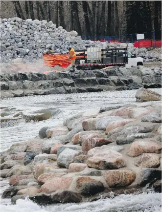  ?? AL CHAREST ?? The $8-million reconstruc­tion of the Bow River’s Harvie Passage was meant to improve safety and flood resistance, but it is also providing top-notch rapids for an excited local kayaking community.