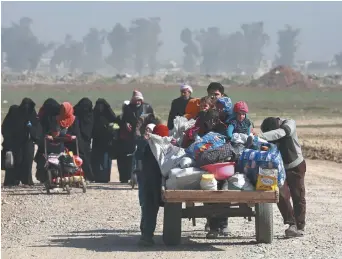  ?? − Associated Press: Khalid Mohammed ?? Pour les anciens habitants de la 2e ville irakienne, le retour à la normale est loin d’être acquis.