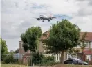  ??  ?? A British Airways Boeing 787 descending to land at Heathrow. Photograph: Malcolm Park/Alamy