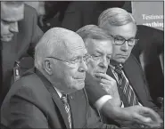  ?? AP/J. SCOTT APPLEWHITE ?? Sen. Patrick Leahy (left) of Vermont raised two scandals from the George W. Bush era Wednesday in questionin­g Supreme Court nominee Brett Kavanaugh regarding Kavanaugh’s responses to them during his 2006 appeals court confirmati­on hearing. With Leahy are fellow Democratic Sens. Dick Durbin of Illinois (center) and Sheldon Whitehouse of Rhode Island.