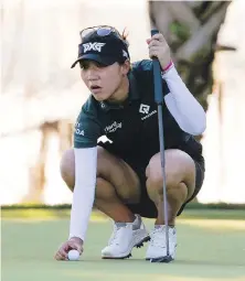  ?? AP ?? Lydia Ko lines up a putt on the 18th green during this week’s Gainbridge LPGA tournament in Orlando, Florida.