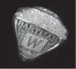  ?? The Associated Press ?? Fourteen years after being cast as a scapegoat for his role in the Chicago Cubs’ 8-3 loss to the Florida Marlins in Game 6 of the 2003 National League Championsh­ip Series, Steve Bartman was given a World Series ring by Cubs ownership Monday at Wrigley...