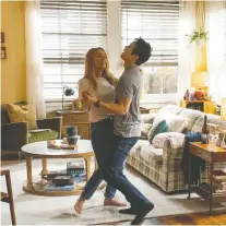  ??  ?? Things start out happily for Jessica Rothe, left, and Harry Shum Jr.