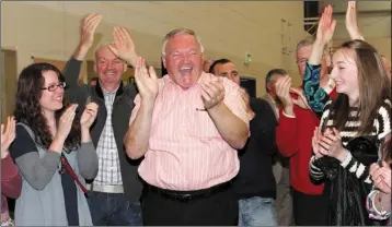  ??  ?? Martin Murphy celebrates after topping the poll in the New Ross district in 2014. He is not standing for election next month, having announced his retirement from politics.