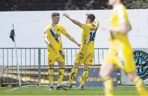  ??  ?? Altrincham's Ryan Colclough celebrates after scoring the goal which condemned the Magpies to defeat at York Road. Photo: Darren Woolley.