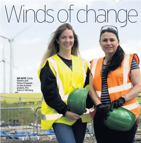  ??  ?? ON SITE Emily Rankin and Shino Chawash on the turbine project. Pic: Garry F McHarg