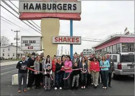  ?? DONNA ROVINS — DIGITAL FIRST MEDIA ?? Deborah Piergrossi took ownership of Lower Pottsgrove’s Hilltop Drive-In restaurant on March 1. Shown here is a ribbon cutting with friends and family to mark the occasion.