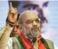  ?? — PTI ?? Home minister Amit Shah speaks during a rally in Mumbai on Sunday.